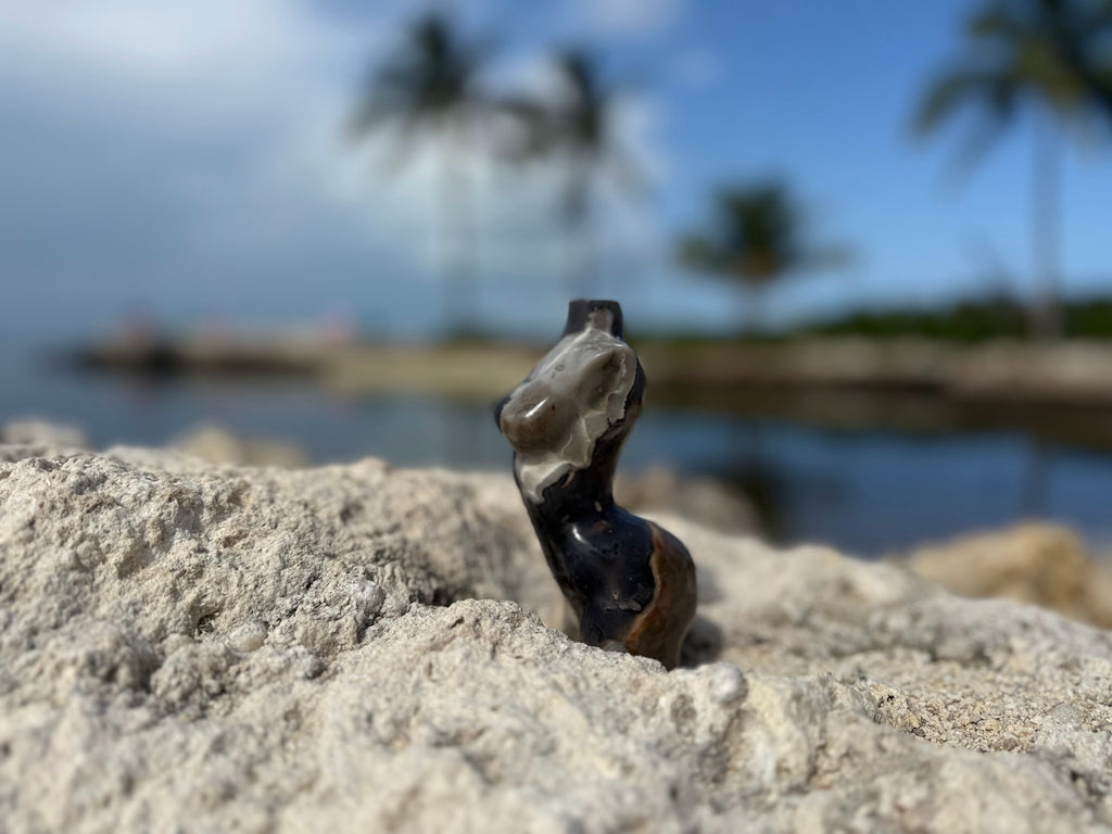 Volcanic agate female figure, quartz shoulder detail