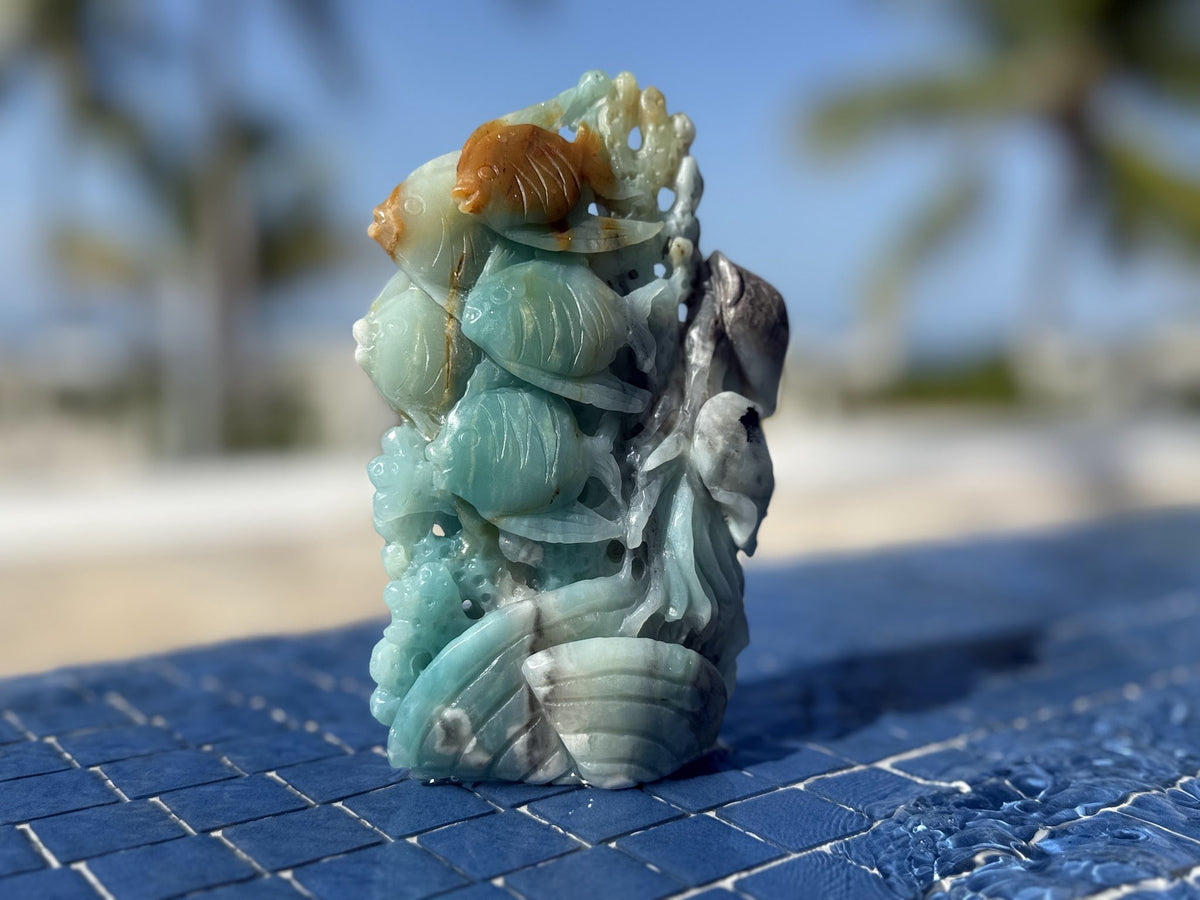 Caribbean Calcite Reef Tower Carving — Amber Goldfish