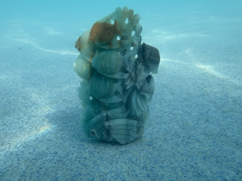 Caribbean Calcite Reef Tower Carving — Amber Goldfish