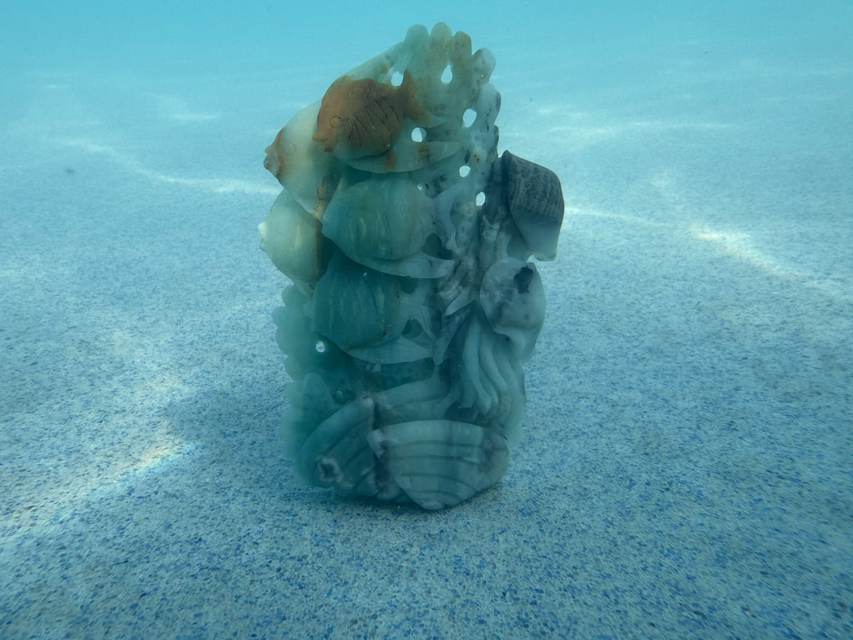 Caribbean Calcite Reef Tower Carving — Amber Goldfish