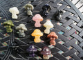 Mixed gemstone mushroom carvings — assorted stones