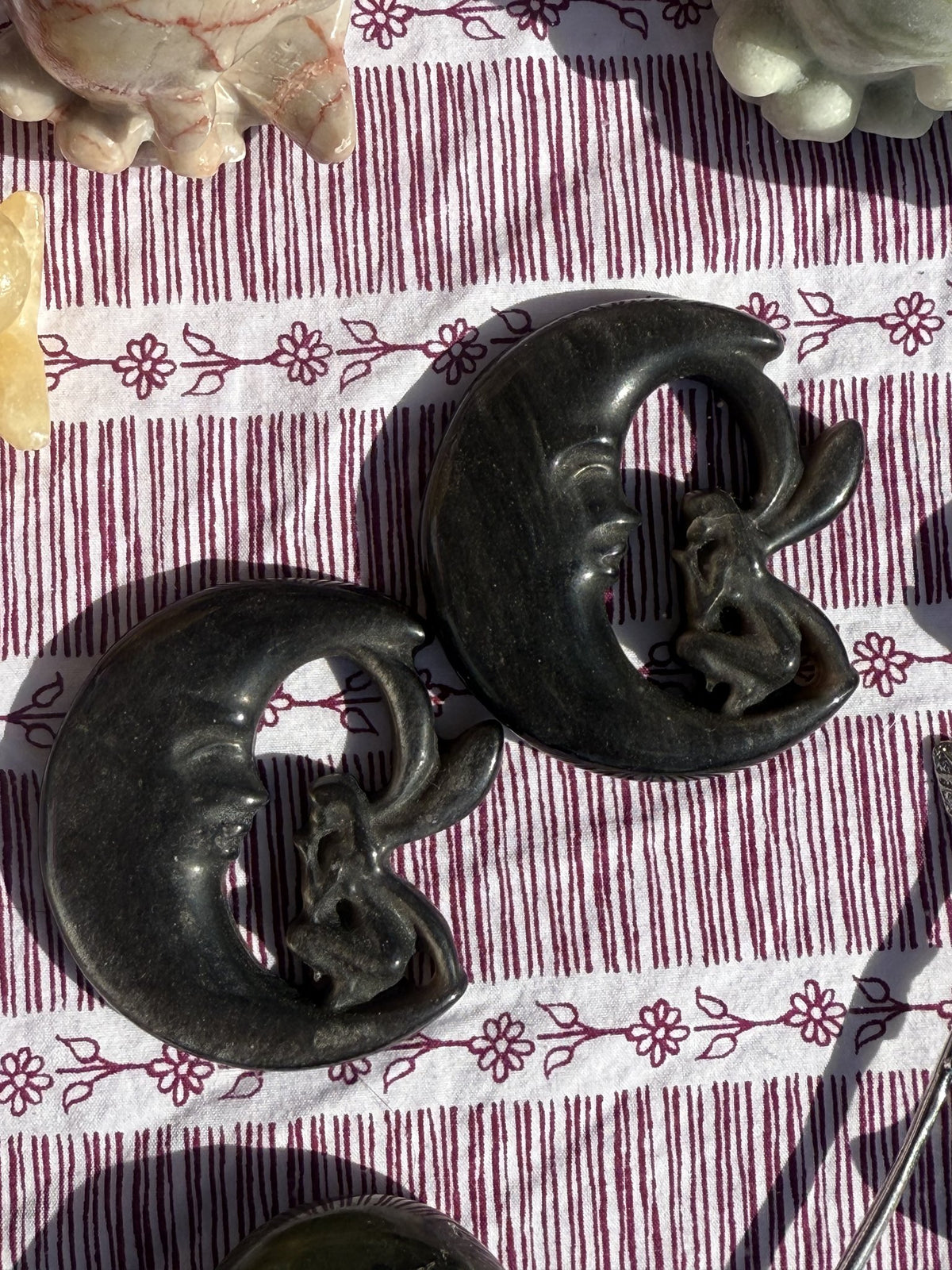 Black obsidian crescent moons with faeries, pair