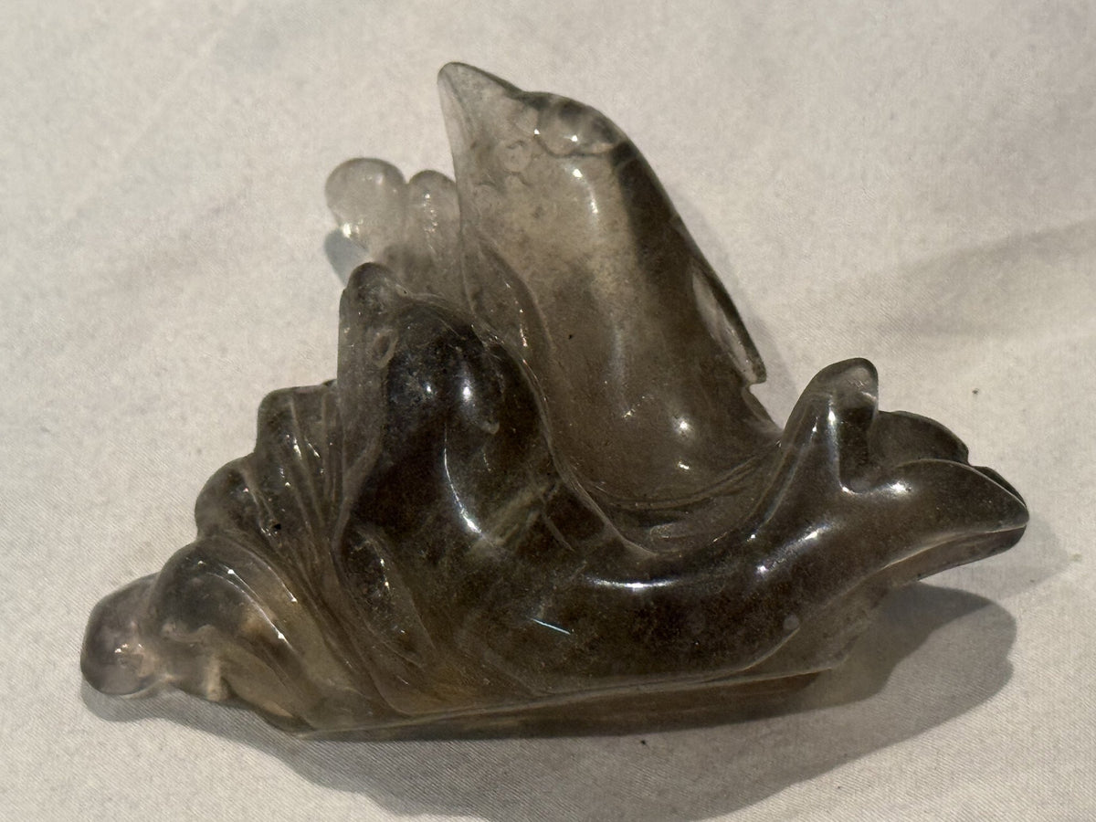 Libyan desert glass dolphin carving angle four