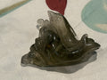 Libyan desert glass dolphin wave carving