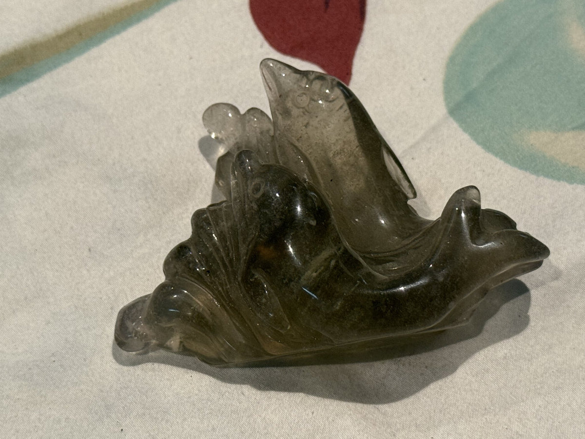 Libyan desert glass dolphin wave carving