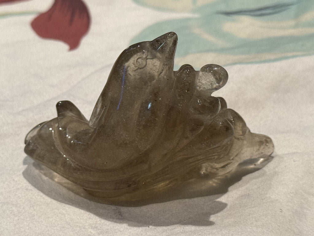 Libyan desert glass dolphin carving angle three