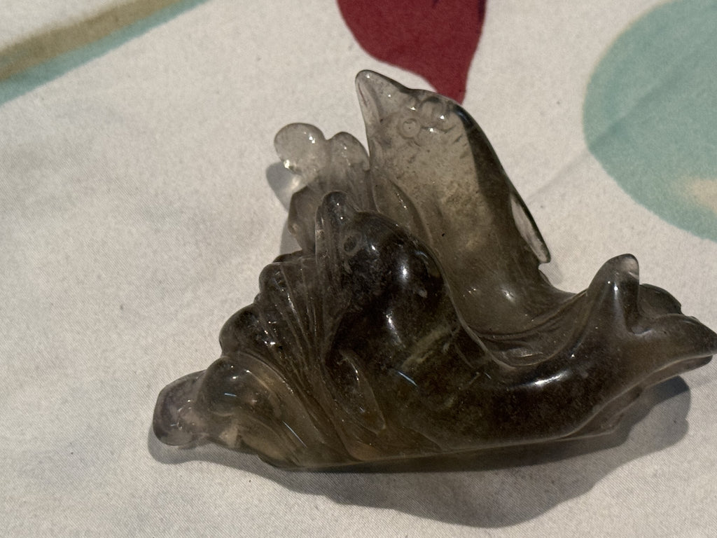 Libyan desert glass dolphin carving